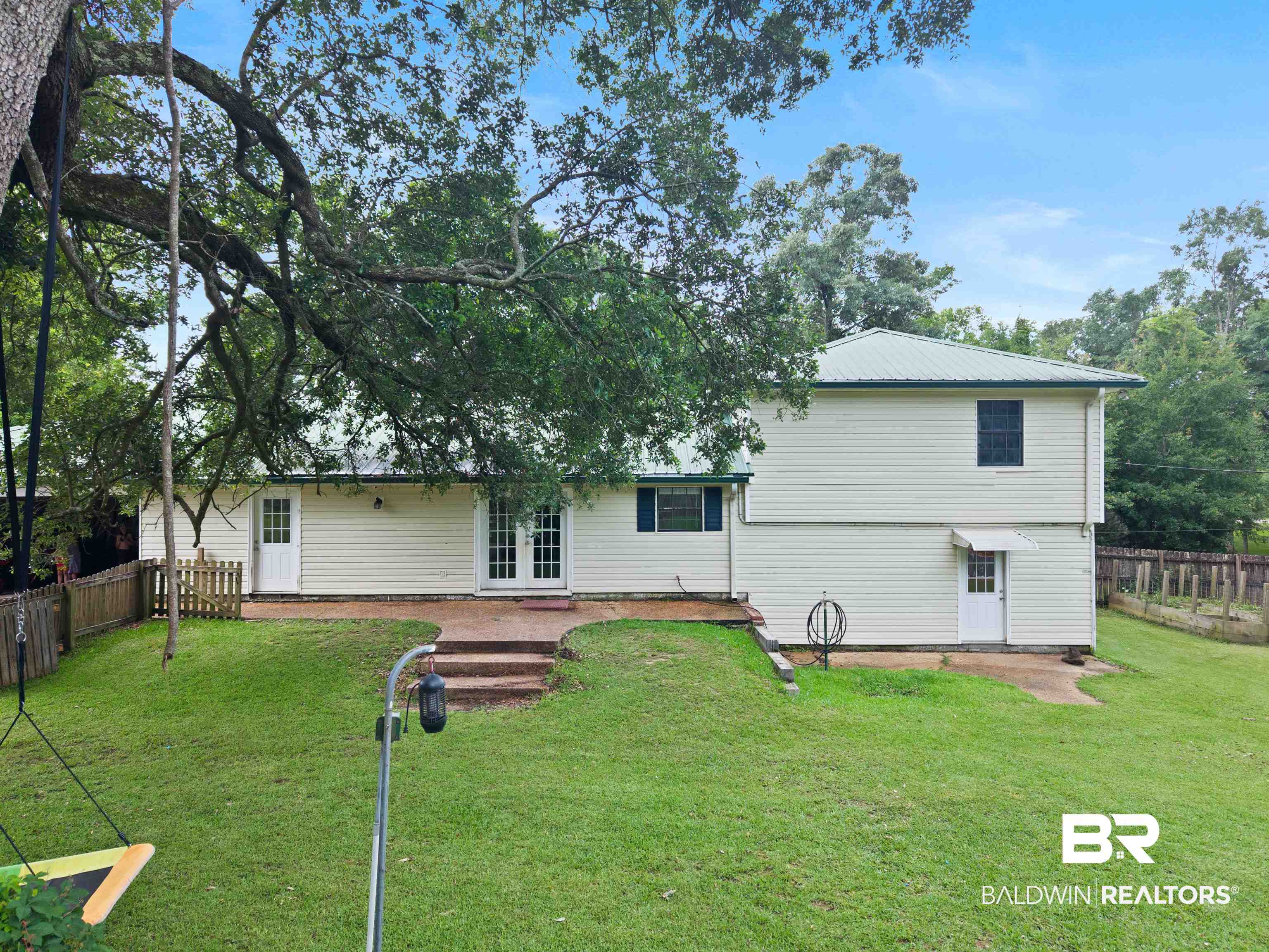 10420 Johnson Road South Mobile, AL 36695 - Photo 53 of 75 Spacious backyard featuring a sloped lawn and mature trees