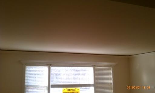 5025 North East River Road, Unit 2B Norridge, IL 60706 - Photo 3 of 9 a view of an empty room with a window