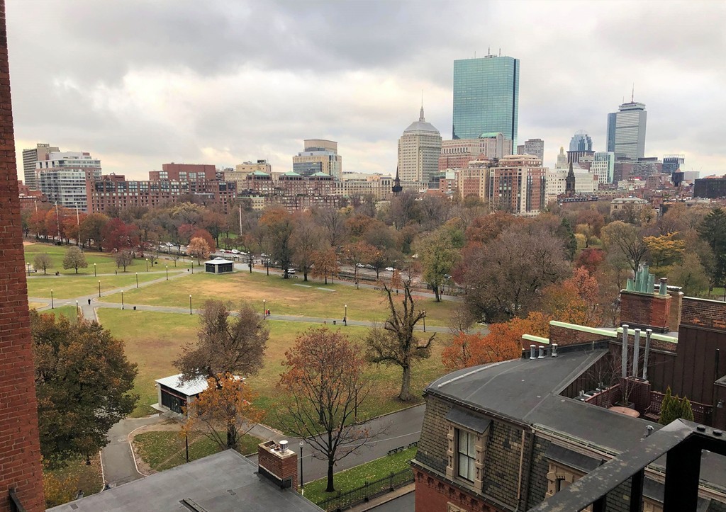 48 Beacon Street, Unit 9R Boston, MA 02108 - Photo 17 of 21 a view of a city with tall buildings