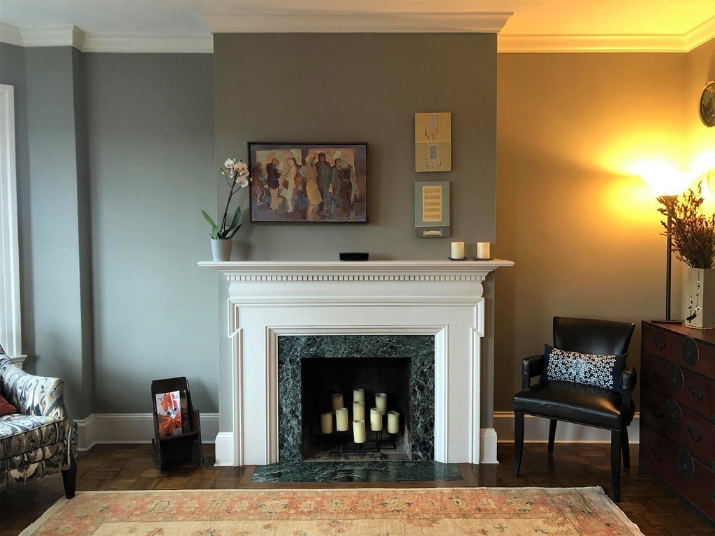48 Beacon Street, Unit 9R Boston, MA 02108 - Photo 4 of 21 a living room with furniture and a fireplace