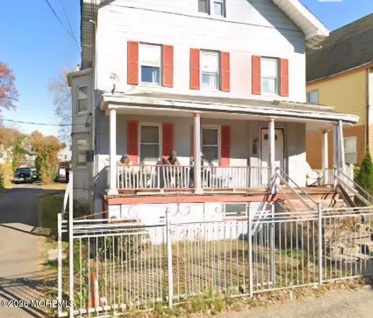 front view of a house with a balcony