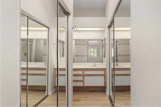 a bathroom with a shower and a sink