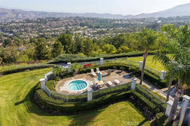 a view of a swimming pool with a lake view