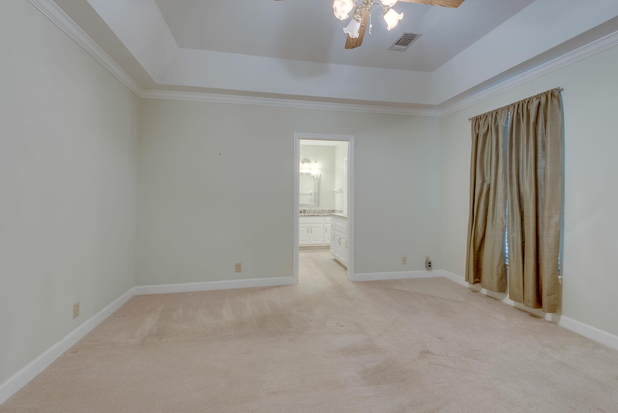 528 General George Patton Road Nashville, TN 37221 - Photo 19 of 26 Down stairs Master Bedroom with trey ceiling.