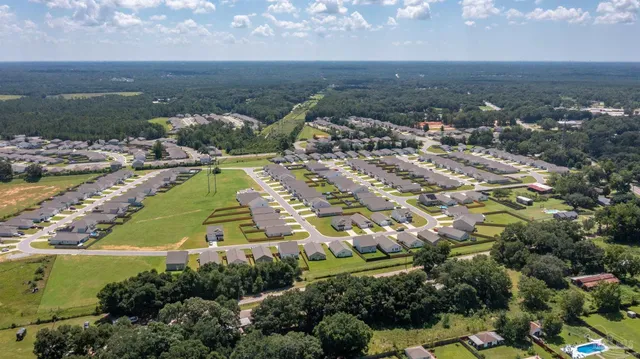 a view of a city with an ocean