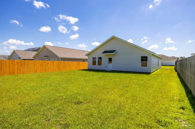 a view of a house with a swimming pool