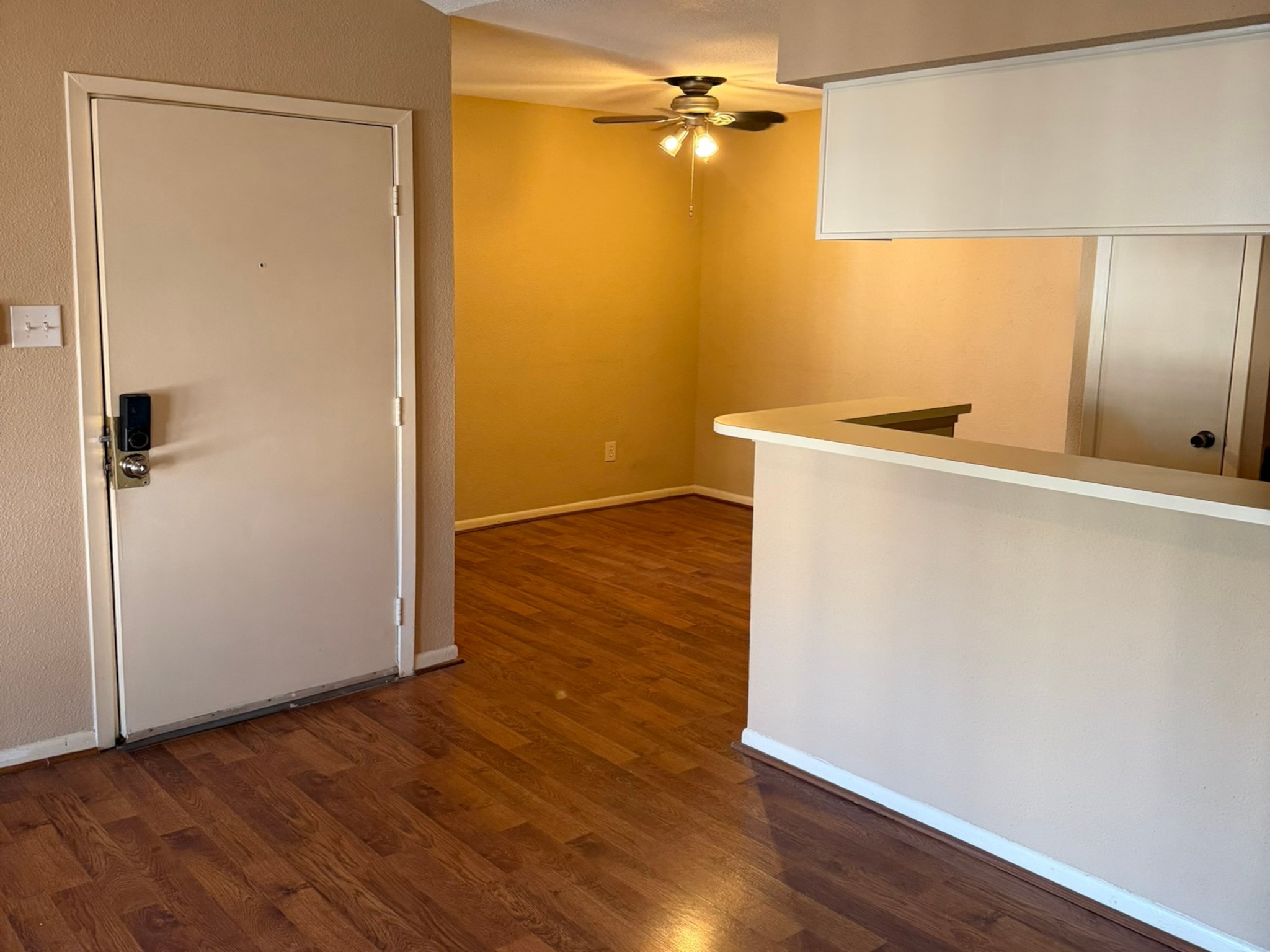 9000 Bissonnet Street, Unit 512 Houston, TX 77074 - Photo 3 of 13 an empty room with wooden floor