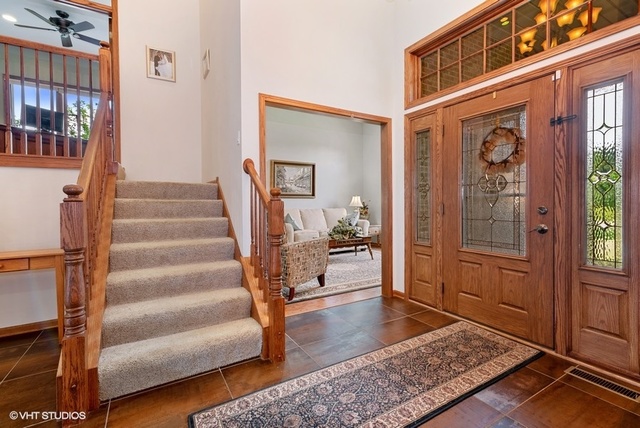 3812 Redwood Court Spring Grove, IL 60071 - Photo 11 of 37 a view of front door with furniture and a rug