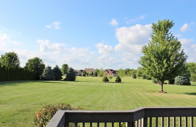 3812 Redwood Court Spring Grove, IL 60071 - Photo 16 of 37 a view of an outdoor space and a yard
