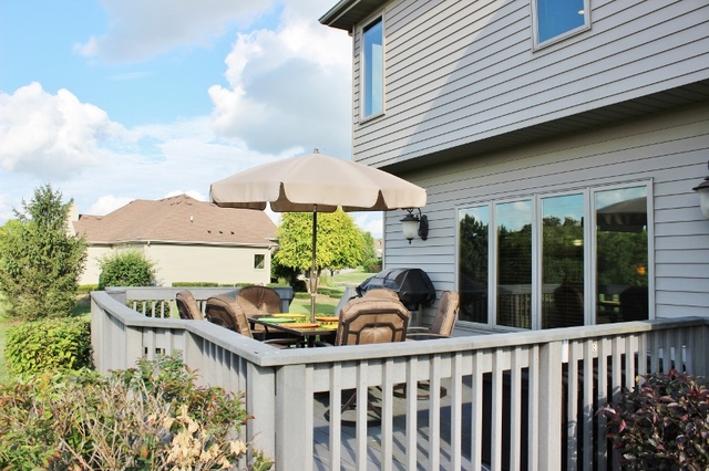 3812 Redwood Court Spring Grove, IL 60071 - Photo 17 of 37 a view of a chair and tables front of the house