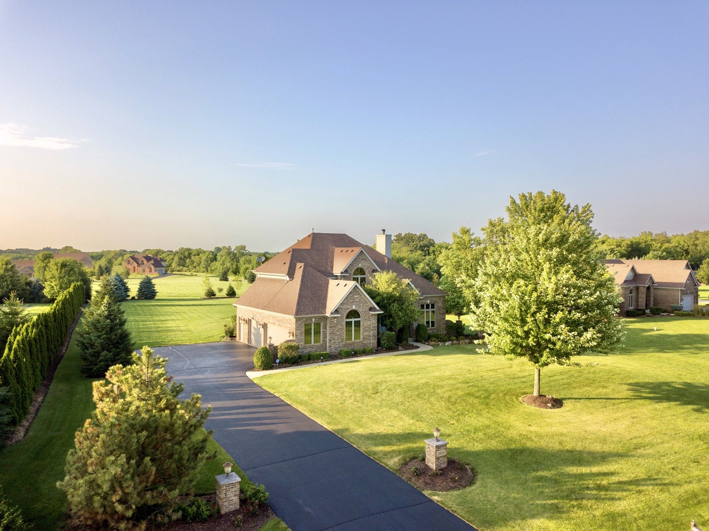 3812 Redwood Court Spring Grove, IL 60071 - Photo 3 of 37 a view of a swimming pool with an ocean view