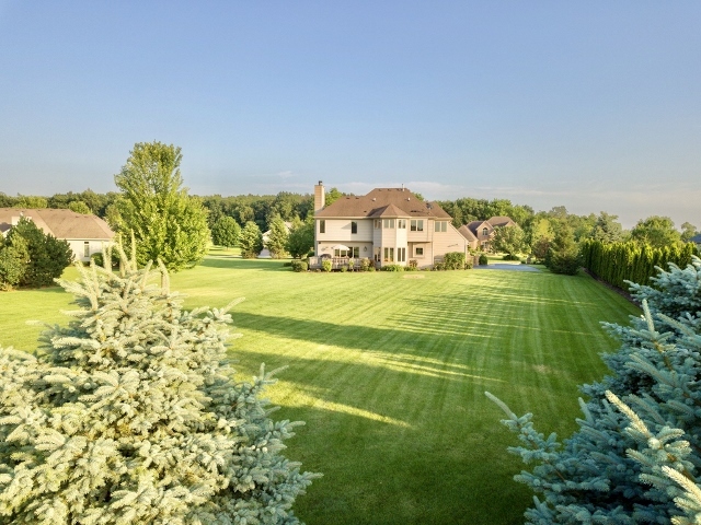 3812 Redwood Court Spring Grove, IL 60071 - Photo 33 of 37 a view of a field with an trees