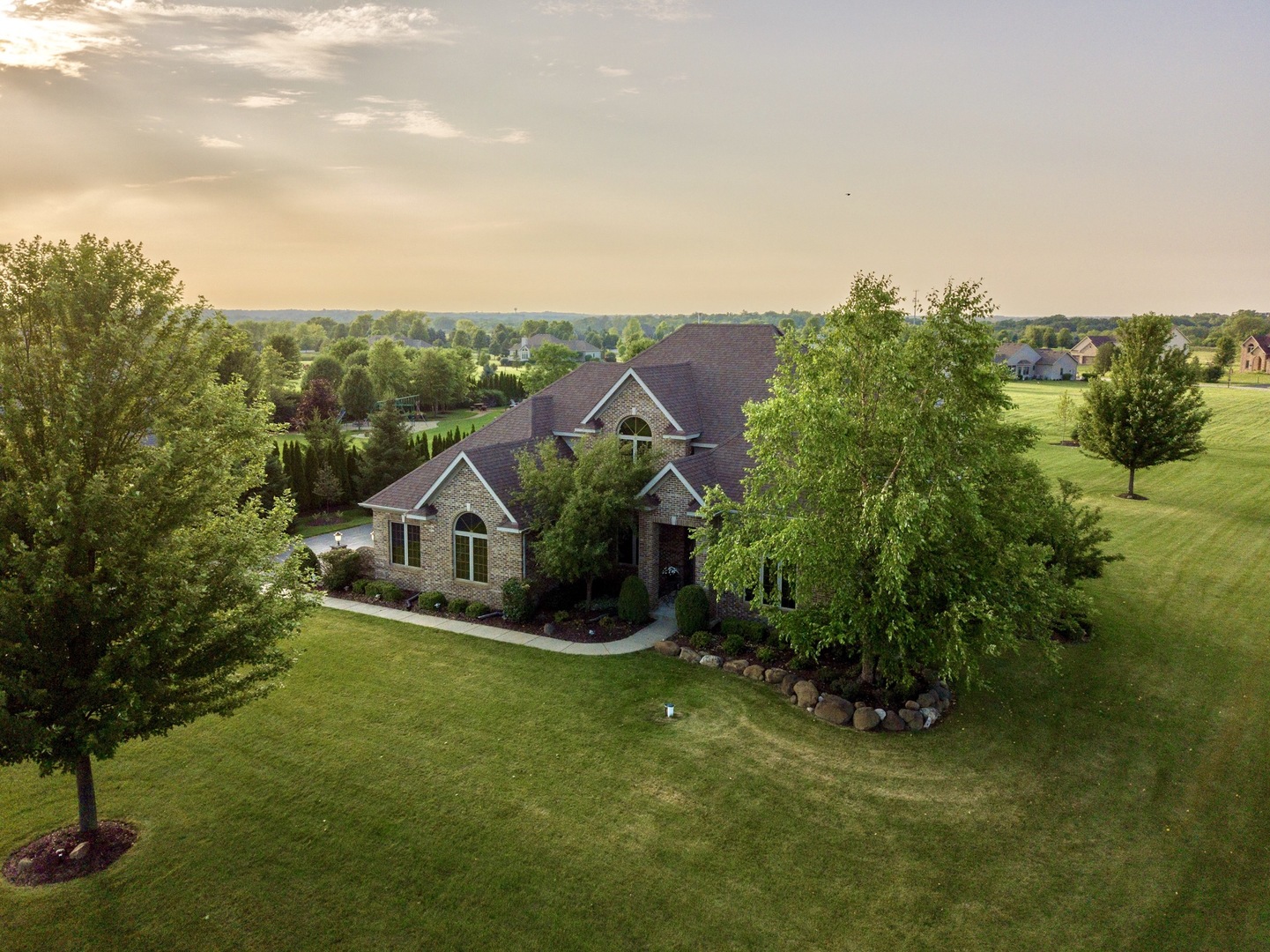3812 Redwood Court Spring Grove, IL 60071 - Photo 35 of 37 a view of a house with a big yard