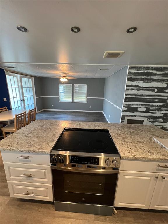 6528 Roosevelt Drive Port Richey, FL 34668 - Photo 15 of 42 a close view of stove