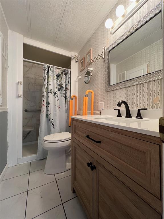 6528 Roosevelt Drive Port Richey, FL 34668 - Photo 26 of 42 a bathroom with a toilet sink shower and mirror