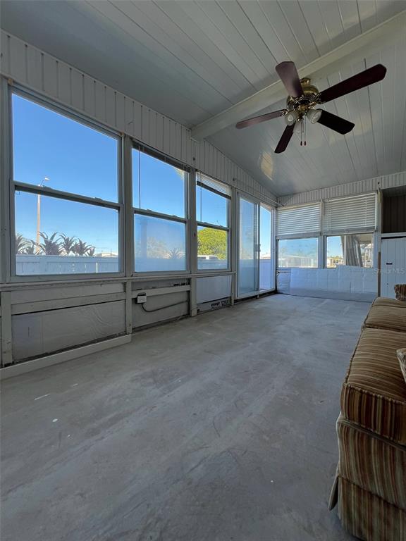 6528 Roosevelt Drive Port Richey, FL 34668 - Photo 30 of 42 a living room with furniture and a window