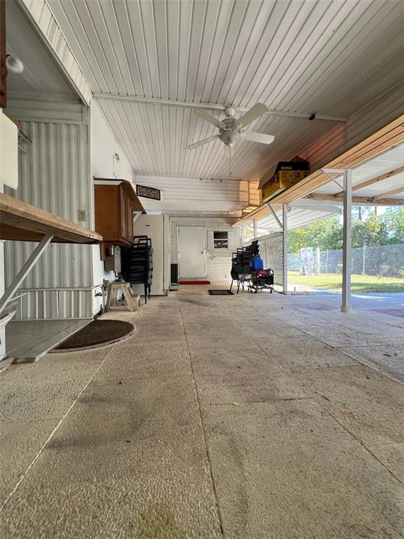 6528 Roosevelt Drive Port Richey, FL 34668 - Photo 33 of 42 a view of a livingroom with furniture and a fireplace