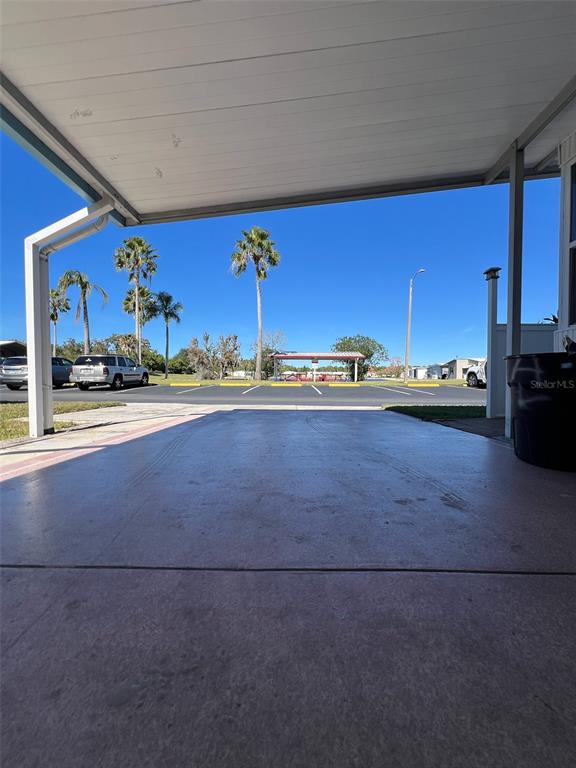 6528 Roosevelt Drive Port Richey, FL 34668 - Photo 4 of 42 a kitchen with stainless steel appliances a sink stove and refrigerator
