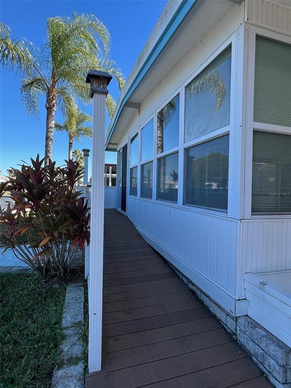 6528 Roosevelt Drive Port Richey, FL 34668 - Photo 5 of 42 a view of a house with a yard