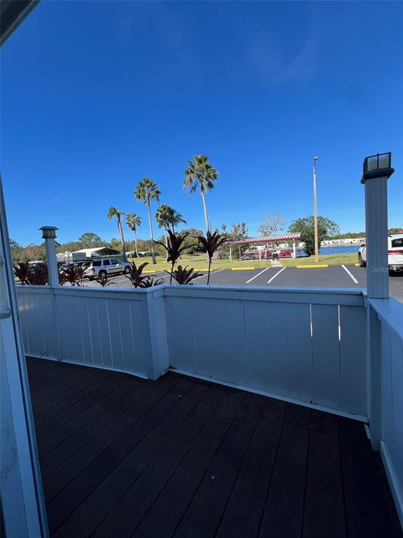 6528 Roosevelt Drive Port Richey, FL 34668 - Photo 6 of 42 a view of a room with wooden floor