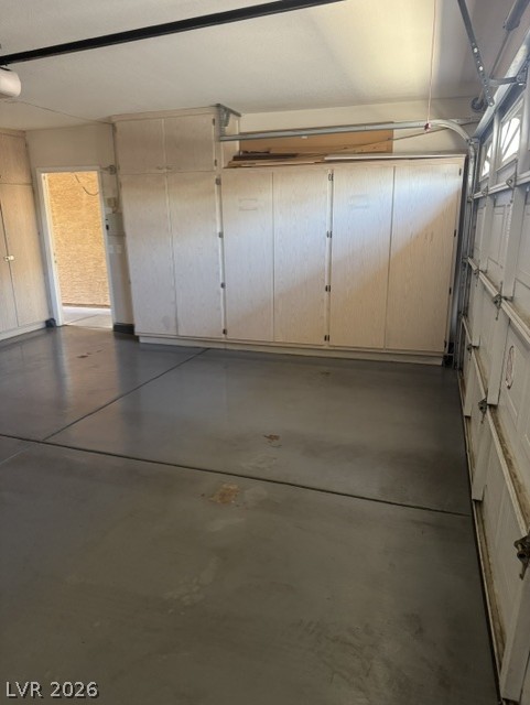 1851 Hillpointe Road, Unit 1412 Henderson, NV 89074 - Photo 8 of 12 Ample built-in cabinetry provides organized storage within this functional garage.