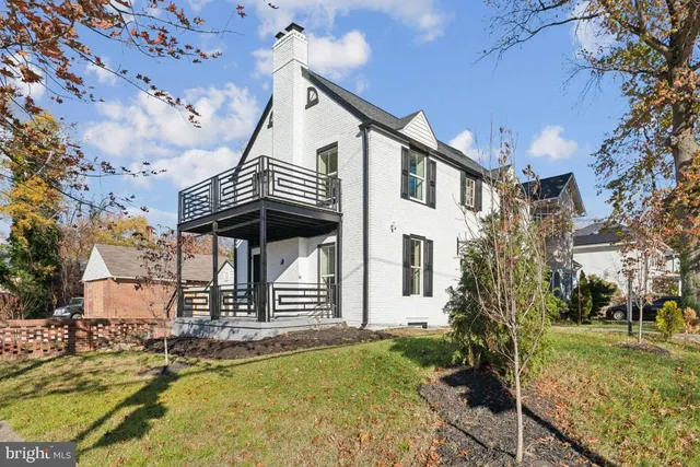 a front view of a house with swimming pool