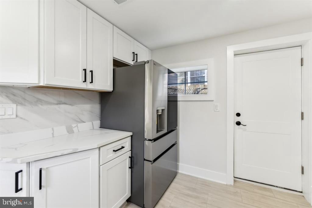 1400 Franklin Street Northeast Washington, DC 20018 - Photo 42 of 51 Carriage house kitchen with rear exit