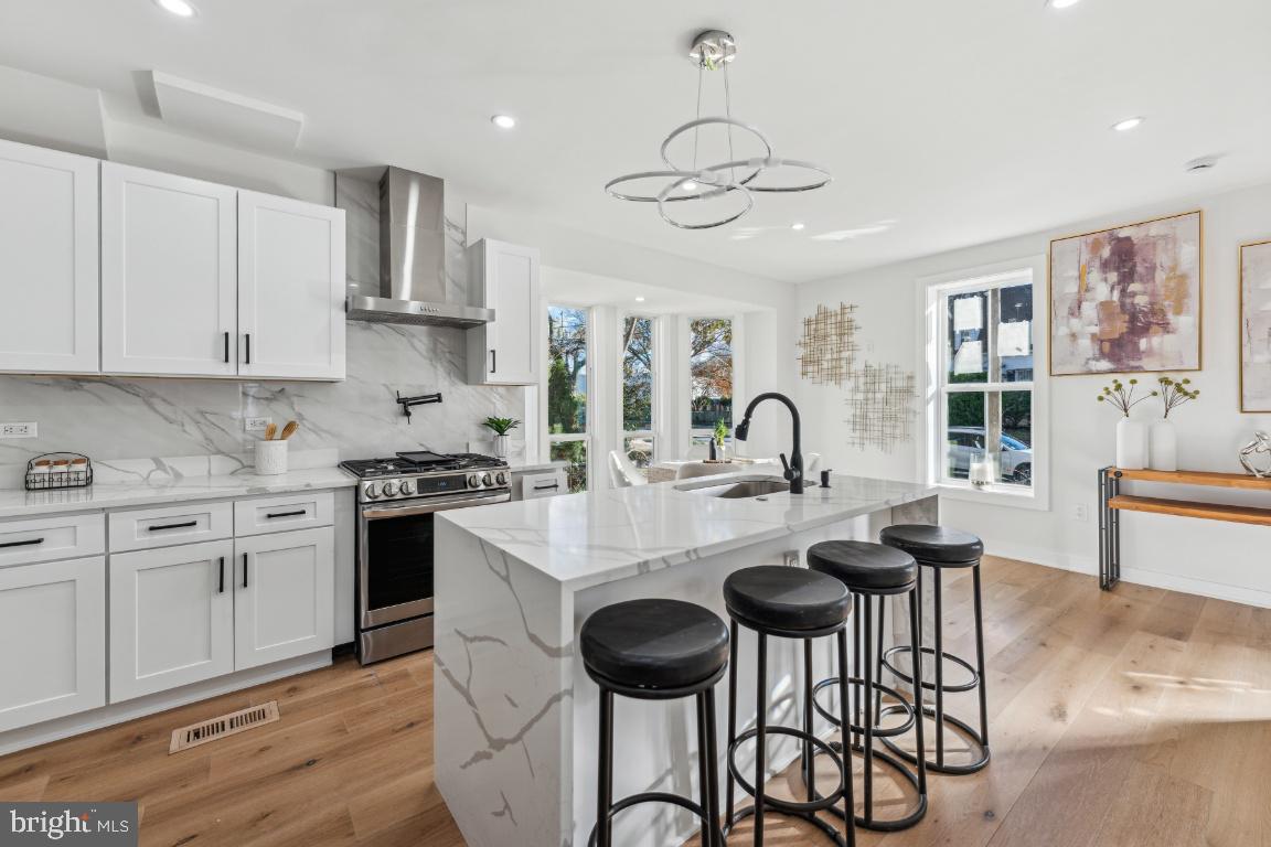 1400 Franklin Street Northeast Washington, DC 20018 - Photo 10 of 51 Waterfall quartz island in gourmet kitchen
