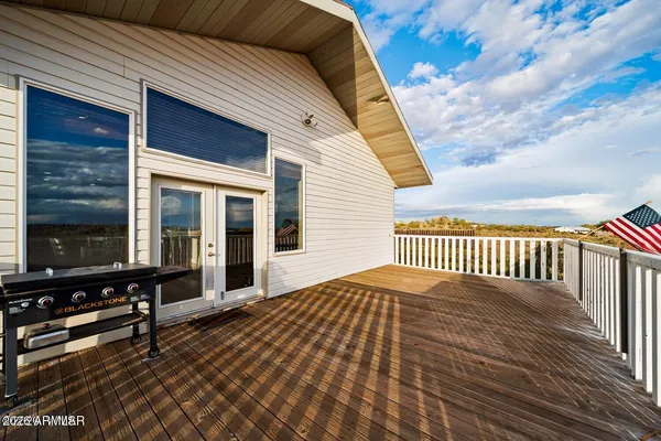 a living room with furniture window and a wooden floor