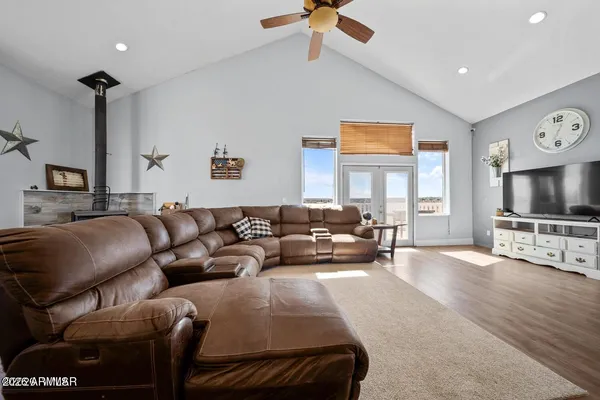 a bedroom with a bed and hallway