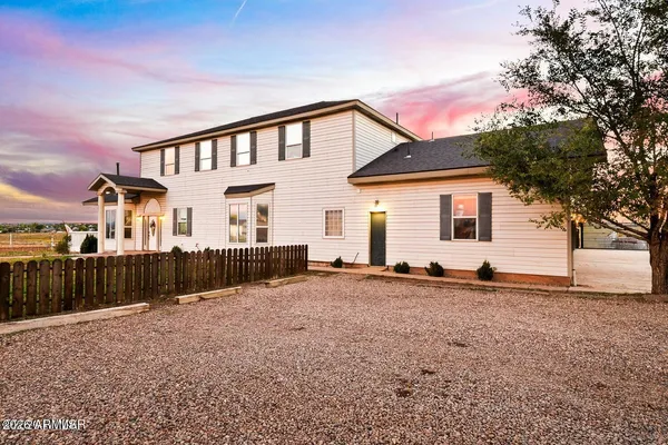 a view of a deck with wooden floor and outdoor space