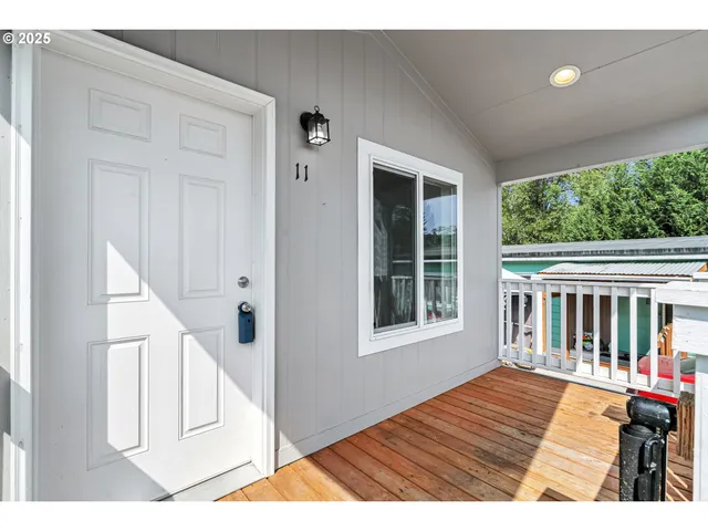 a view of kitchen with a sink and a window