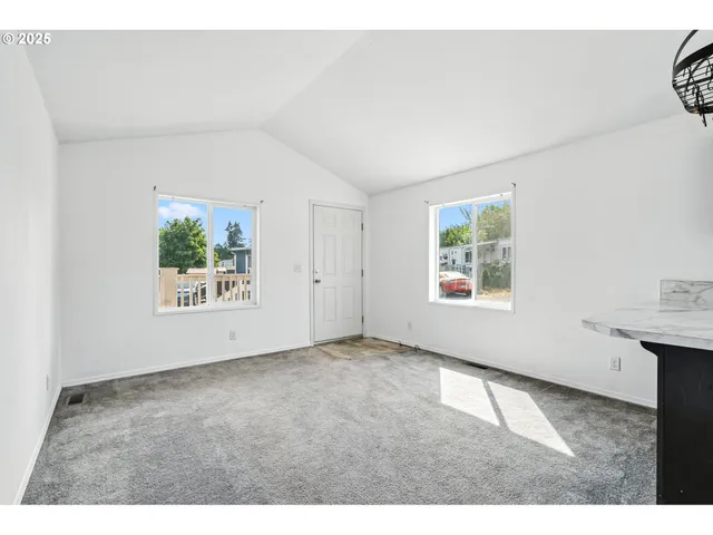 a bathroom with a sink a large mirror and a sink