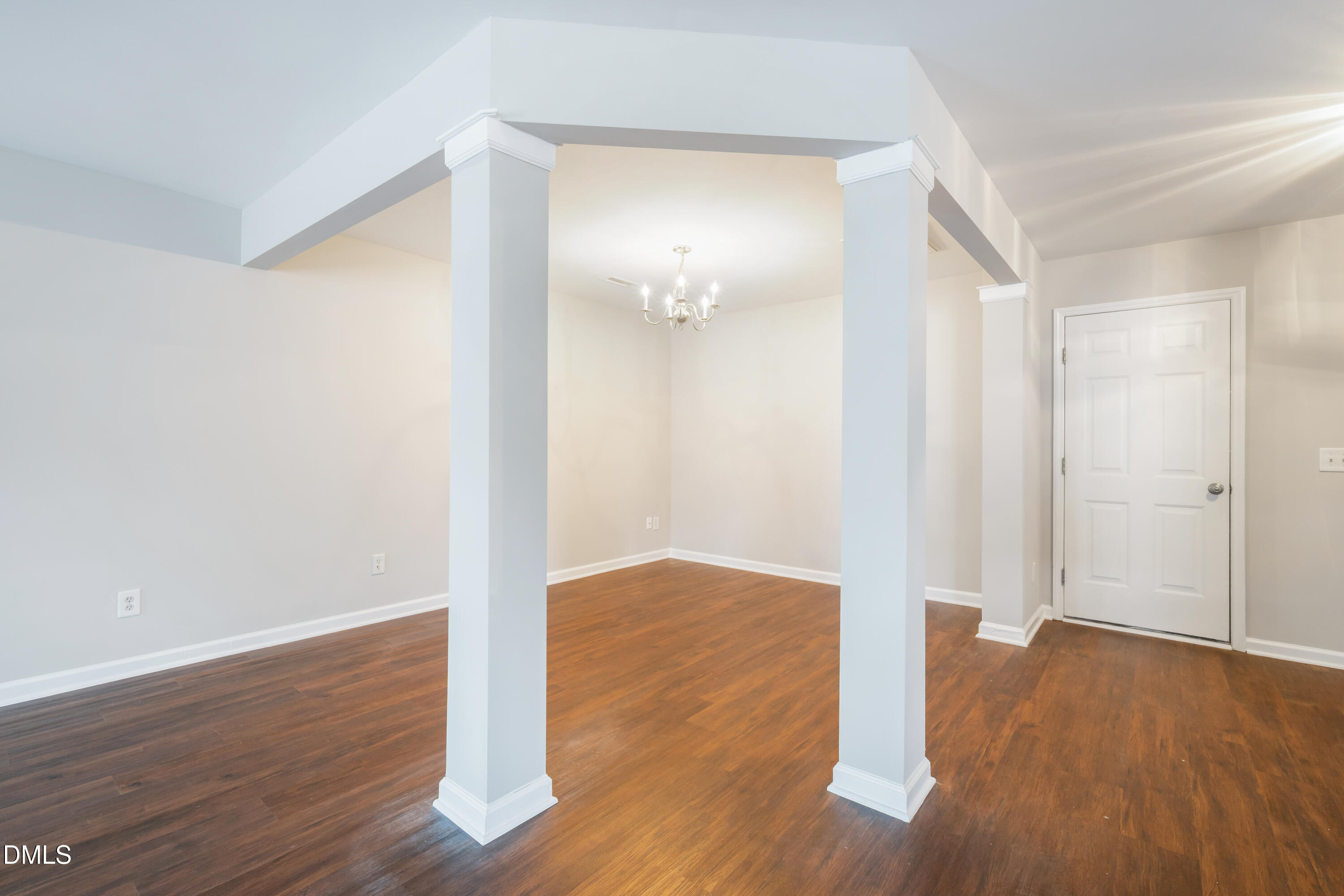 1532 Pebble Ridge Drive Raleigh, NC 27610 - Photo 13 of 40 a view of a room with wooden floor