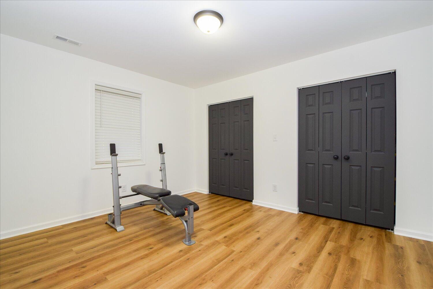105 Old Post Road Moneta, VA 24121 - Photo 26 of 45 a view of a room with wooden floor and furniture