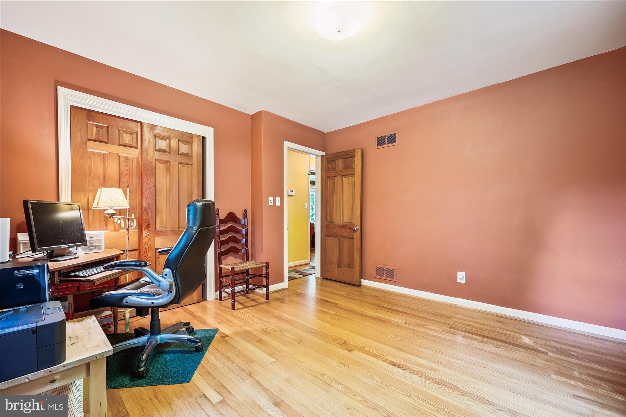 111 Ednor Road Silver Spring, MD 20905 - Photo 24 of 36 a view of a workspace with furniture and a window