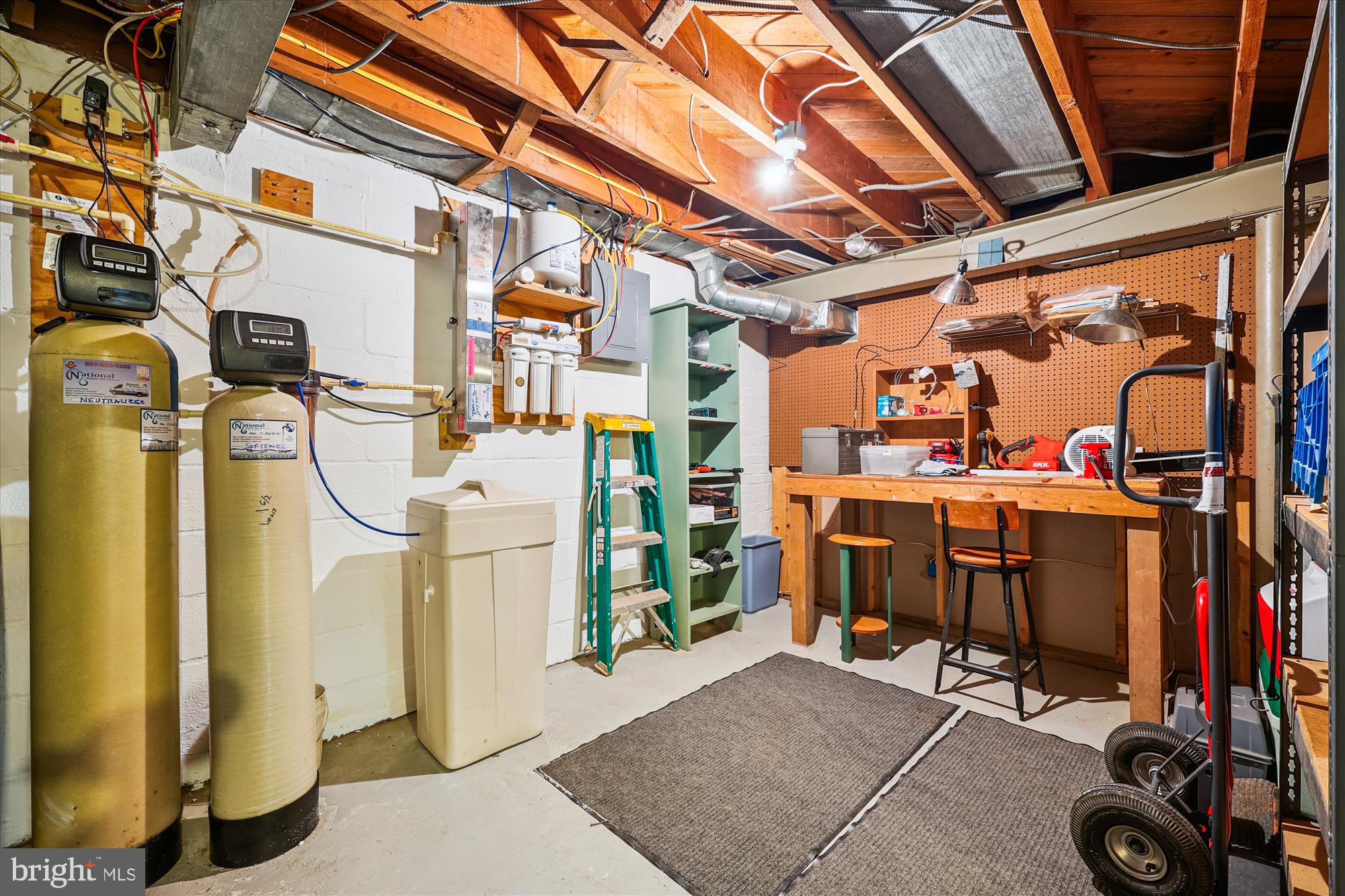 111 Ednor Road Silver Spring, MD 20905 - Photo 35 of 36 a view of a storage room with washer and dryer