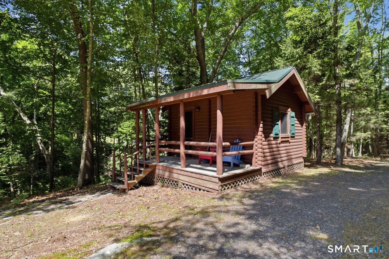 369 Saybrook Road Haddam, CT 06441 - Photo 22 of 29 The summer sleeping cabin overlook the lake.