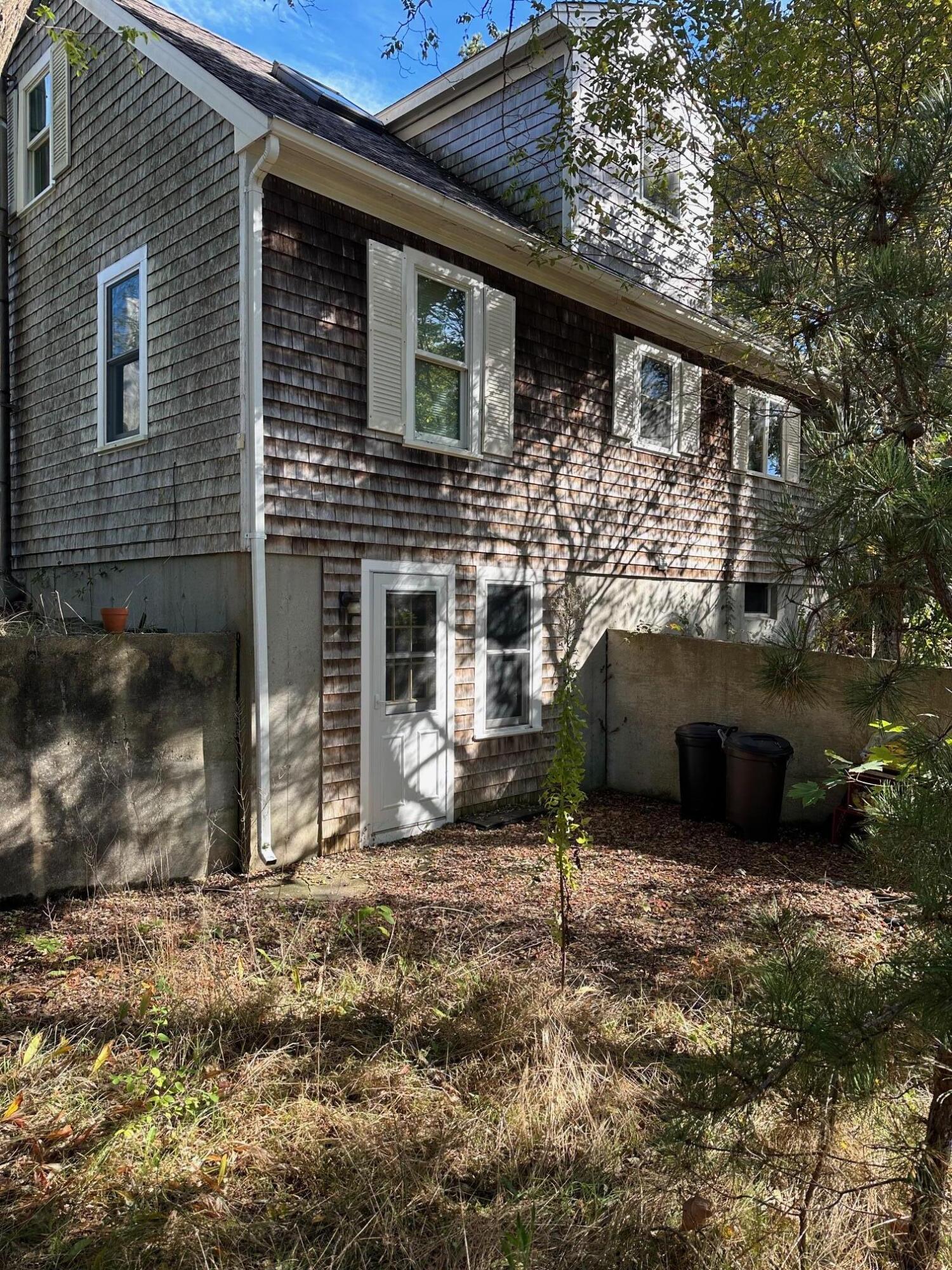 16 Warren Road Wellfleet, MA 02667 - Photo 6 of 24 a view of a house with a yard