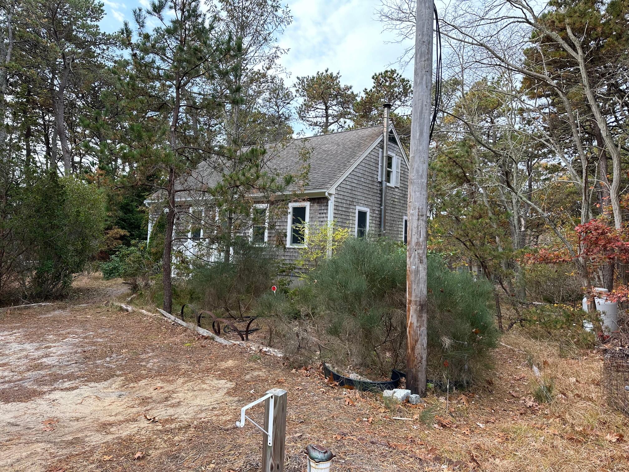 16 Warren Road Wellfleet, MA 02667 - Photo 9 of 24 a view of a house with a yard