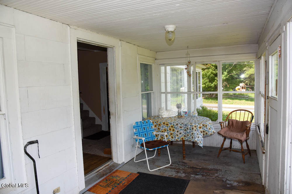 574 Morse Memorial Highway Minerva, NY 12857 - Photo 11 of 42 E Side Porch