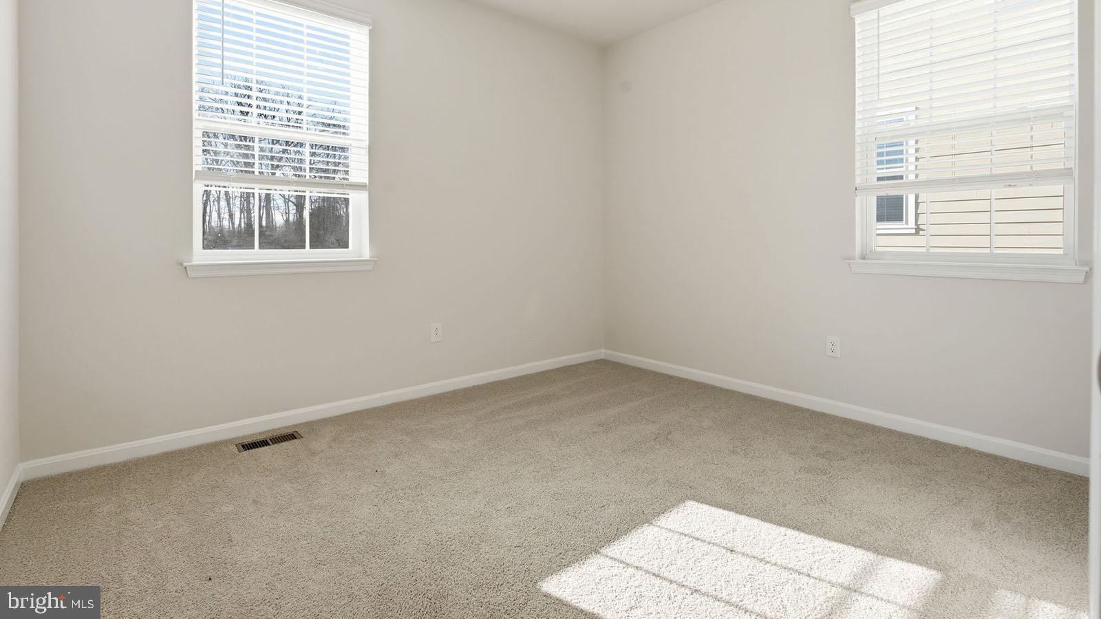 8110 Cypress Pt Drive Rosedale, MD 21237 - Photo 15 of 37 an empty room with a window