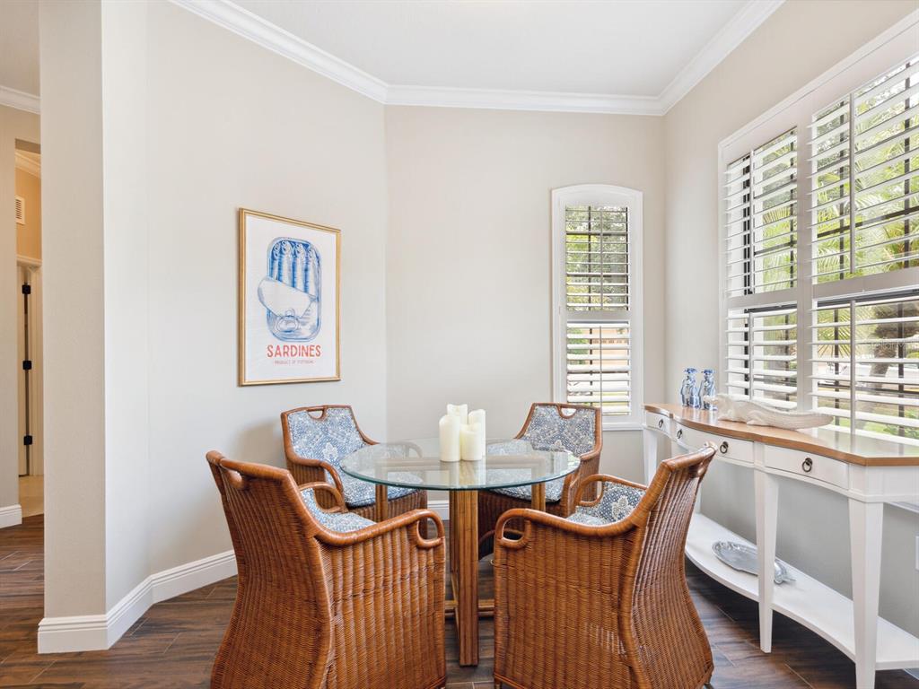 14325 Stirling Drive Lakewood Ranch, FL 34202 - Photo 18 of 53 a dining room with furniture and window
