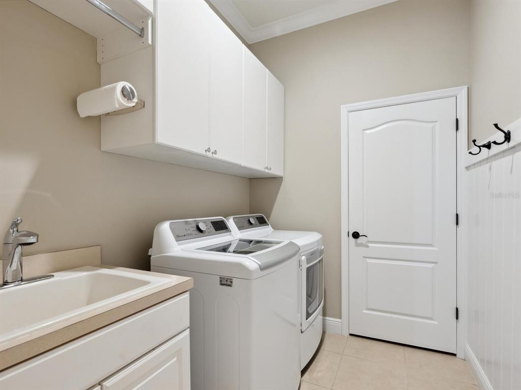 14325 Stirling Drive Lakewood Ranch, FL 34202 - Photo 30 of 53 a utility room with dryer and washer