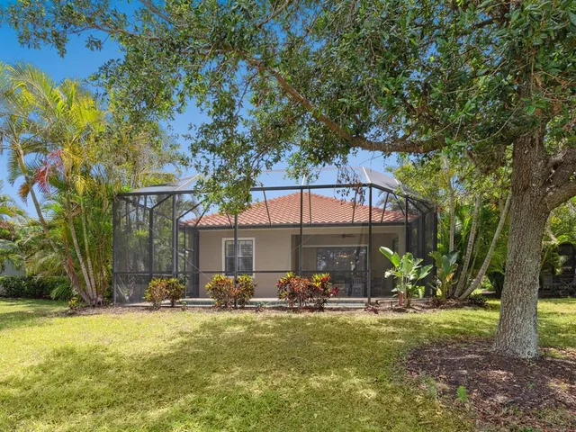 a front view of house with yard and seating area