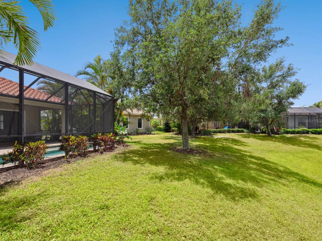 14325 Stirling Drive Lakewood Ranch, FL 34202 - Photo 33 of 53 a view of a swimming pool with sitting area