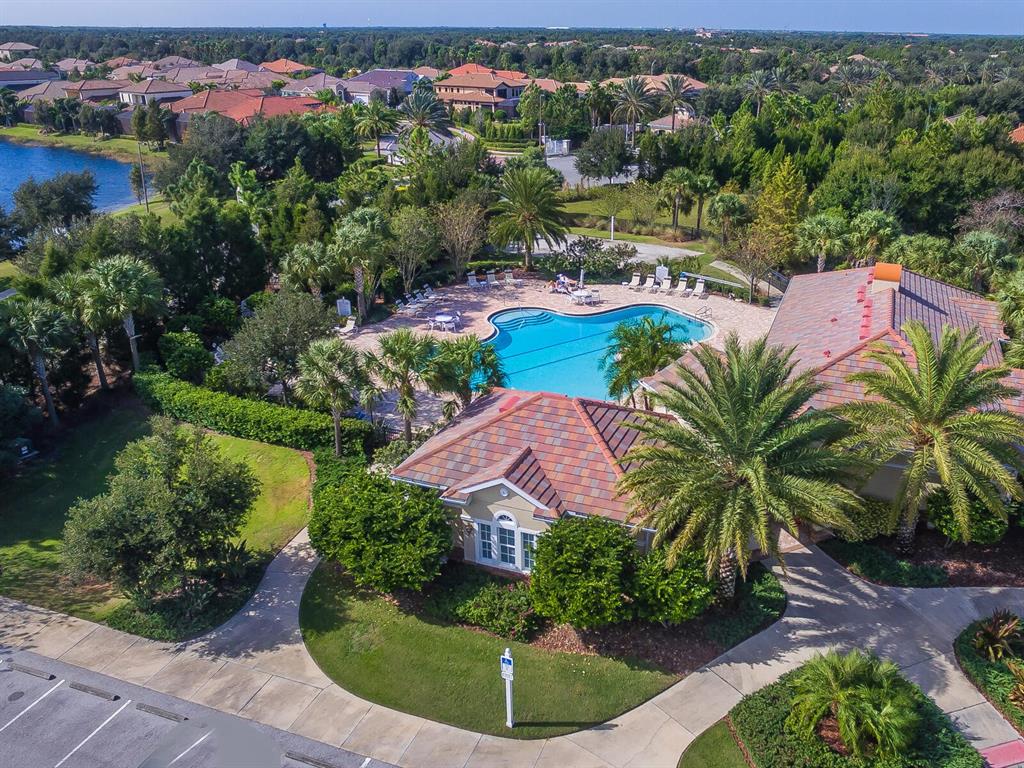 14325 Stirling Drive Lakewood Ranch, FL 34202 - Photo 40 of 53 an aerial view of a house with garden space and lake view