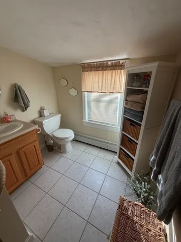 a view of a livingroom with wooden floor