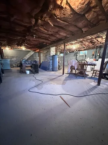 a view of a livingroom with furniture and window
