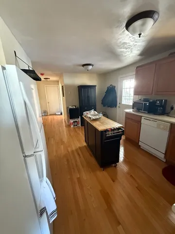 a living room with a couch and a table